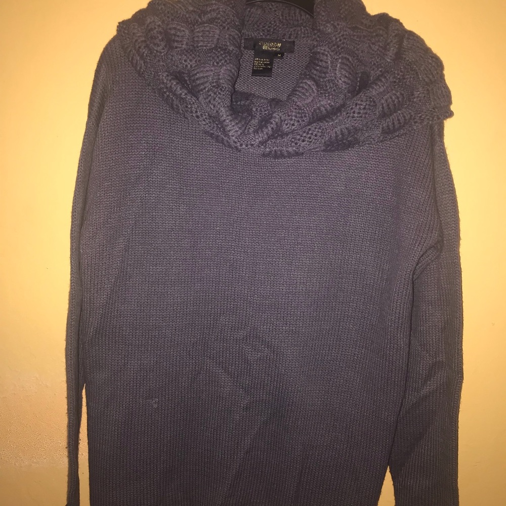 Gray knit cowl neck sweater.